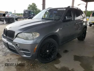 2012 BMW X5 35i with VIN 5UXZV4C56CL889802, listed as a Copart auction lot 62302265 with Not provided miles and Clean title. Bid and sale history available at DreamBid. Image 1.