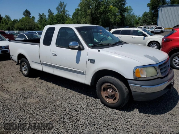 2002 Ford F-150 XL with VIN 1FTRX17L42NB56461, listed as a Copart auction lot 59988885 with 244,057 mi miles and Clean title. Bid and sale history available at DreamBid. Image 4.
