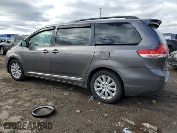 2014 Toyota Sienna LE with VIN 5TDJK3DCXES078004, listed as a Copart auction lot 48161085 with 220,254 mi miles and Clean Title. Bid and sale history available at DreamBid. Image 2.