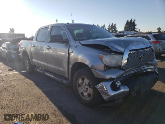 2011 Toyota Tundra 4WD Truck with VIN 5TFDY5F18BX178269, listed as a Copart auction lot 83202154 with 128,034 mi miles and Salvage Title. Bid and sale history available at carsss.com. Image 4.