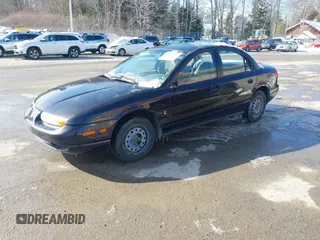 2000 Saturn SL z VIN 1G8ZH5280YZ223608, wystawiony jako IAAI lot #41377752 z przebiegiem 180 857 mil mil oraz . Historia ofert i sprzedaży dostępna na DreamBid. Obrazek 2.