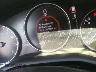 2022 Mazda CX-30 S Carbon Edition with VIN 3MVDMBCL6NM423255, listed as a IAAI auction lot 42209829 with 51,589 mi miles and . Bid and sale history available at DreamBid. Image 7.