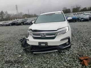 2020 Honda Pilot Touring 8-Passenger with VIN 5FNYF6H95LB053631, listed as a Copart auction lot 47732865 with 67,728 mi miles and Salvage Title. Bid and sale history available at DreamBid. Image 12.