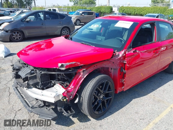 2023 Honda Civic Sport z VIN 2HGFE2F54PH559259, wystawiony jako IAAI lot #42201601 z przebiegiem 42 807 mil mil oraz . Historia ofert i sprzedaży dostępna na DreamBid. Obrazek 6.