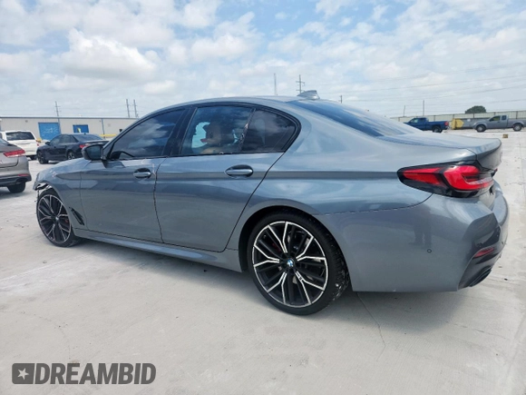 2022 BMW 5 Series 530i with VIN WBA53BH00NWX59634, listed as a Copart auction lot 61598505 with 69,130 mi miles and Salvage title. Bid and sale history available at DreamBid. Image 2.