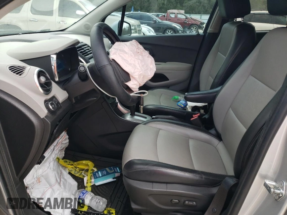 2016 Chevrolet Trax LTZ with VIN 3GNCJRSB5GL255423, listed as a Copart auction lot 86134524 with 61,776 mi miles and Salvage Title. Bid and sale history available at carsss.com. Image 7.