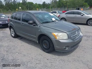 2012 Dodge Caliber SXT with VIN 1C3CDWDA6CD510605, listed as a IAAI auction lot 42104688 with 221,059 mi miles. Bid and sale history available at carsss.com. Image 1.