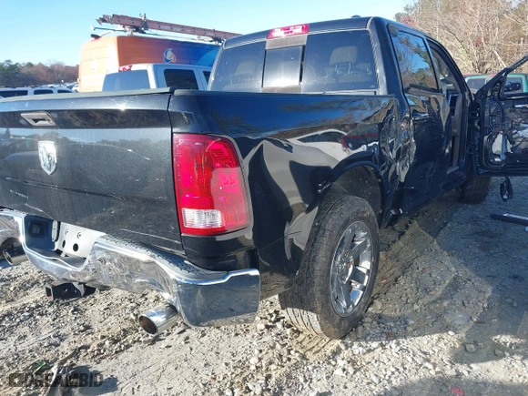 2009 Dodge Ram 1500 Sport with VIN 1D3HB13T99S772935, listed as a IAAI auction lot 41006604 with 118,772 mi miles. Bid and sale history available at carsss.com. Image 4.