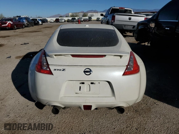 2014 Nissan 370Z Touring with VIN JN1AZ4EH5EM635783, listed as a Copart auction lot 85475214 with 107,712 mi miles and Salvage Title. Bid and sale history available at carsss.com. Image 6.