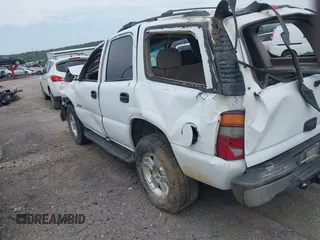 2002 Chevrolet Tahoe LT with VIN 1GNEC13Z52J341962, listed as a IAAI auction lot 42391522 with 239,452 mi miles and . Bid and sale history available at DreamBid. Image 3.
