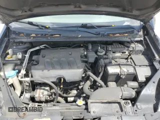 2009 Nissan Sentra S FE+ z VIN 3N1AB61E79L691865, wystawiony jako Copart lot #53956455 z przebiegiem 179 480 mil mil oraz Szkoda całkowita • Salvage title. Historia ofert i sprzedaży dostępna na DreamBid. Obrazek 11.