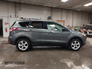 2014 Ford Escape SE with VIN 1FMCU9G9XEUD69423, listed as a IAAI auction lot 41908718 with 65,149 mi miles. Bid and sale history available at carsss.com. Image 13.