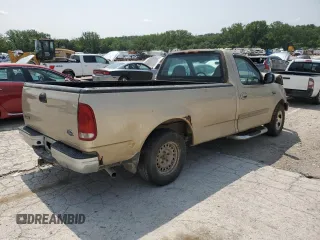 1999 Ford F-150 with VIN 1FTRF17W8XKA37849, listed as a Copart auction lot 58383265 with Not provided miles and Salvage title. Bid and sale history available at DreamBid. Image 3.
