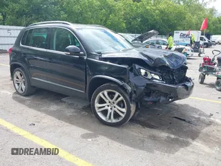 2013 Volkswagen Tiguan SE with VIN WVGBV7AX4DW522207, listed as a IAAI auction lot 42348044 with 41,916 mi miles and . Bid and sale history available at DreamBid. Image 1.