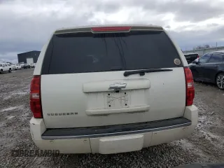 2010 Chevrolet Suburban LTZ with VIN 1GNUKKE37AR274407, listed as a Copart auction lot 49613125 with 195,184 mi miles and Salvage Title. Bid and sale history available at carsss.com. Image 6.
