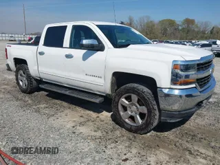 2017 Chevrolet Silverado 1500 LT with VIN 3GCUKREC1HG371811, listed as a IAAI auction lot 41847124 with 196,830 mi miles and . Bid and sale history available at DreamBid. Image 1.