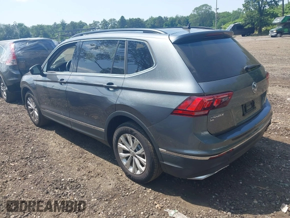2018 Volkswagen Tiguan SEL with VIN 3VV2B7AX8JM068960, listed as a IAAI auction lot 42528062 with 84,644 mi miles and . Bid and sale history available at DreamBid. Image 3.