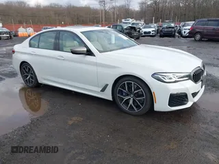2021 BMW 5 Series M550i xDrive z VIN WBA13BK09MCF05866, wystawiony jako IAAI lot #41574859 z przebiegiem 37 822 mil mil oraz . Historia ofert i sprzedaży dostępna na DreamBid. Obrazek 1.