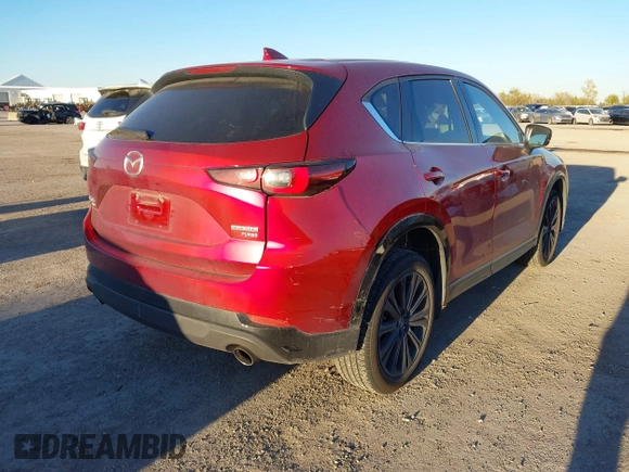 2022 Mazda CX-5 2.5 Turbo with VIN JM3KFBAY4N0564000, listed as a IAAI auction lot 41076013 with 25,106 mi miles and . Bid and sale history available at carsss.com. Image 4.