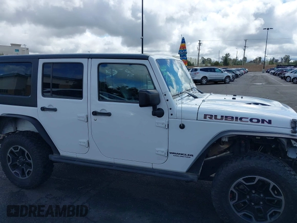 2016 Jeep Wrangler Unlimited Rubicon with VIN 1C4HJWFG7GL254143, listed as a IAAI auction lot 41781962 with 114,435 mi miles and . Bid and sale history available at DreamBid. Image 14.