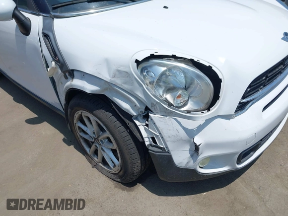2016 MINI Countryman S with VIN WMWZC3C51GWT10248, listed as a IAAI auction lot 42359191 with 77,157 mi miles and . Bid and sale history available at DreamBid. Image 6.