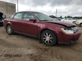 2008 Ford Taurus SEL with VIN 1FAHP24WX8G159335, listed as a Copart auction lot 74106694 with 187,710 mi miles and Salvage Title. Bid and sale history available at carsss.com. Image 4.