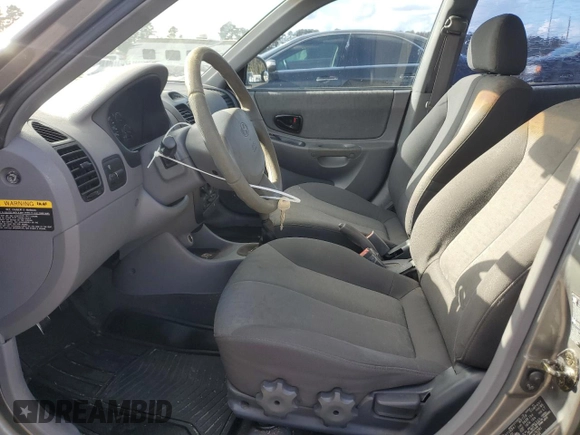 2003 Hyundai Accent GL with VIN KMHCG45C23U476391, listed as a Copart auction lot 78474264 with 155,731 mi miles and Salvage Title. Bid and sale history available at carsss.com. Image 7.