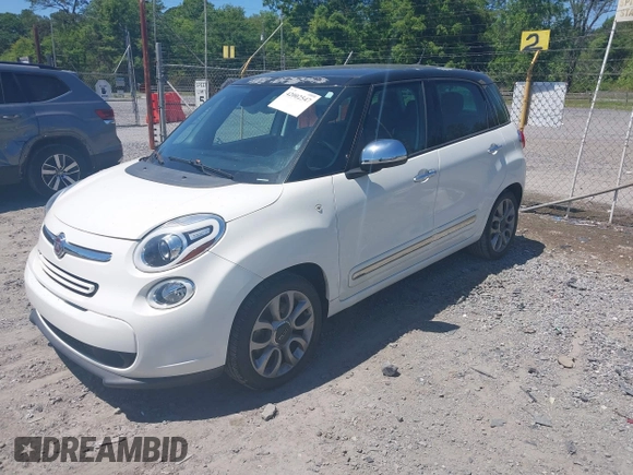 2014 FIAT 500L Lounge with VIN ZFBCFACH8EZ005469, listed as a IAAI auction lot 42002547 with 114,769 mi miles. Bid and sale history available at carsss.com. Image 2.