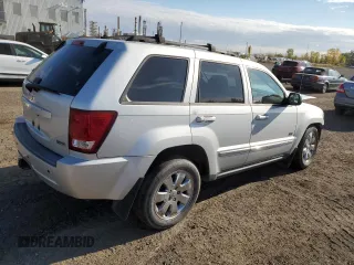 2009 Jeep Grand Cherokee Laredo with VIN 1J8HR48P39C559192, listed as a Copart auction lot 74007094 with 105,997 mi miles and Salvage Title. Bid and sale history available at carsss.com. Image 3.
