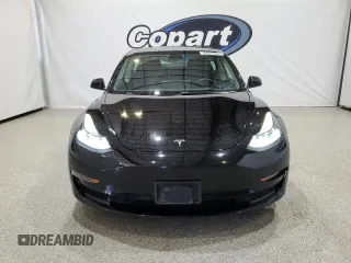 2023 Tesla Model 3 with VIN 5YJ3E1EA4PF452809, listed as a Copart auction lot 63688885 with 125,442 mi miles and Clean title. Bid and sale history available at DreamBid. Image 5.