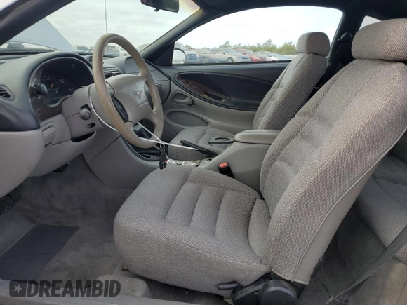 1996 Ford Mustang with VIN 1FALP4047TF106715, listed as a Copart auction lot 78658044 with 60,205 mi miles and Salvage Title. Bid and sale history available at carsss.com. Image 7.