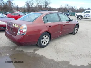 2002 Nissan Altima S with VIN 1N4AL11DX2C216559, listed as a IAAI auction lot 41540001 with 112,084 mi miles. Bid and sale history available at carsss.com. Image 4.