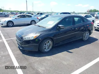2017 Ford Focus SE with VIN 1FADP3FE1HL269626, listed as a IAAI auction lot 42576157 with 144,485 mi miles and . Bid and sale history available at DreamBid. Image 2.
