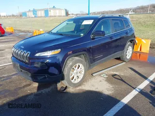2015 Jeep Cherokee Latitude with VIN 1C4PJMCS0FW583658, listed as a IAAI auction lot 41106819 with 101,849 mi miles. Bid and sale history available at carsss.com. Image 4.