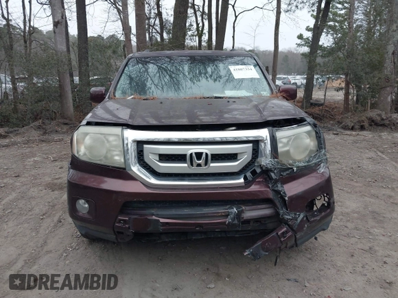 2010 Honda Pilot Touring with VIN 5FNYF4H9XAB040715, listed as a IAAI auction lot 41807334 with 262,786 mi miles and . Bid and sale history available at carsss.com. Image 13.