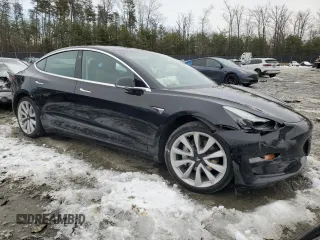2020 Tesla Model 3 Standard Range Plus with VIN 5YJ3E1EAXLF661031, listed as a Copart auction lot 87912605 with Not Provided miles and Salvage Title. Bid and sale history available at DreamBid. Image 4.