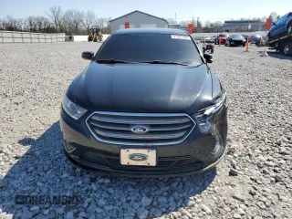 2014 Ford Taurus SEL with VIN 1FAHP2E85EG119210, listed as a Copart auction lot 51581795 with 165,128 mi miles and Salvage Title. Bid and sale history available at DreamBid. Image 5.
