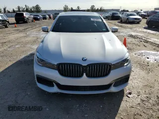2016 BMW 7 Series 740i with VIN WBA7E2C58GG548314, listed as a Copart auction lot 72876922 with 74,981 mi miles. Bid and sale history available at carsss.com. Image 5.