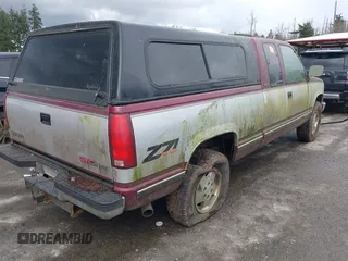 1994 GMC Sierra 1500 z VIN 2GTEK19K0R1559706, wystawiony jako IAAI lot #41906905 z przebiegiem 236 787 mil mil oraz . Historia ofert i sprzedaży dostępna na DreamBid. Obrazek 4.