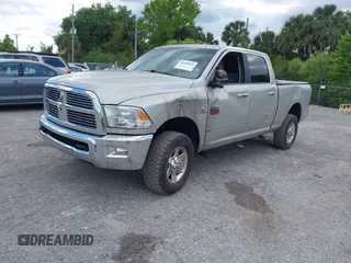 2010 Dodge Ram 2500 SLT with VIN 3D7UT2CL2AG117883, listed as a IAAI auction lot 41844655 with 150,122 mi miles. Bid and sale history available at carsss.com. Image 2.