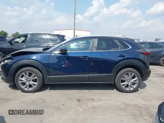 2023 Mazda CX-30 S Carbon Edition with VIN 3MVDMBCM4PM542160, listed as a IAAI auction lot 42175395 with 11,340 mi miles and . Bid and sale history available at DreamBid. Image 14.