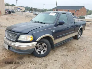 1999 Ford F-150 XL with VIN 1FTRX17L8XNA16906, listed as a IAAI auction lot 41945377 with 249,475 mi miles. Bid and sale history available at carsss.com. Image 18.
