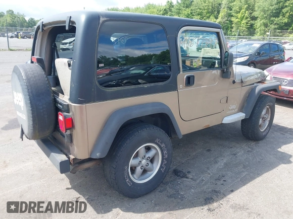 2005 Jeep Wrangler Sport with VIN 1J4FA49SX5P317120, listed as a IAAI auction lot 42677397 with 71,403 mi miles and . Bid and sale history available at DreamBid. Image 4.