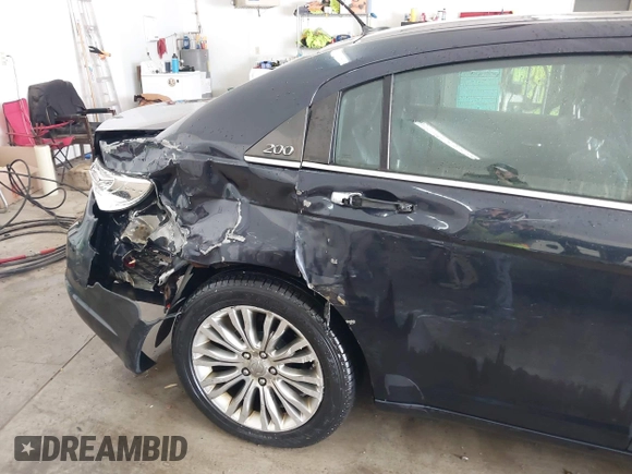 2012 Chrysler 200 Limited with VIN 1C3CCBCG8CN302849, listed as a IAAI auction lot 41286739 with 109,737 mi miles and . Bid and sale history available at DreamBid. Image 18.