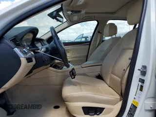 2013 BMW 5 Series 528i xDrive with VIN WBAXH5C59DD114263, listed as a Copart auction lot 56780425 with 128,317 mi miles and Clean title. Bid and sale history available at DreamBid. Image 7.