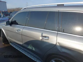 2016 Mercedes-Benz GL with VIN 4JGDF7DE3GA658765, listed as a IAAI auction lot 41416303 with 122,284 mi miles. Bid and sale history available at carsss.com. Image 14.