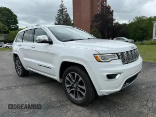 2018 Jeep Grand Cherokee Overland z VIN 1C4RJFCG8JC505915, wystawiony jako Copart lot #58612095 z przebiegiem 112 817 mil mil oraz Czysty tytuł • Clean title. Historia ofert i sprzedaży dostępna na DreamBid. Obrazek 1.