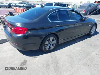 2013 BMW 5 Series 528i with VIN WBAXG5C58DD232582, listed as a IAAI auction lot 41890082 with 150,401 mi miles and . Bid and sale history available at carsss.com. Image 4.