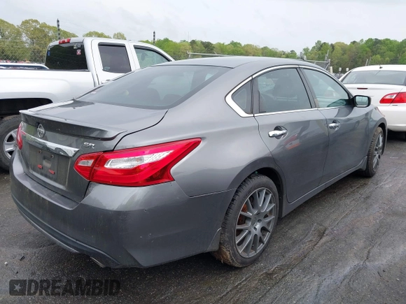 2016 Nissan Altima SR with VIN 1N4AL3AP1GC233201, listed as a IAAI auction lot 41974813 with 117,965 mi miles and . Bid and sale history available at carsss.com. Image 4.