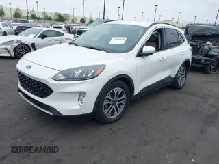 2020 Ford Escape SEL with VIN 1FMCU0H62LUB20143, listed as a IAAI auction lot 42058158 with 159,233 mi miles and . Bid and sale history available at DreamBid. Image 2.